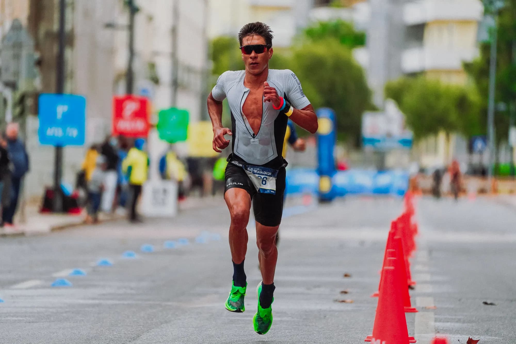 A triathlete running in a tri suit